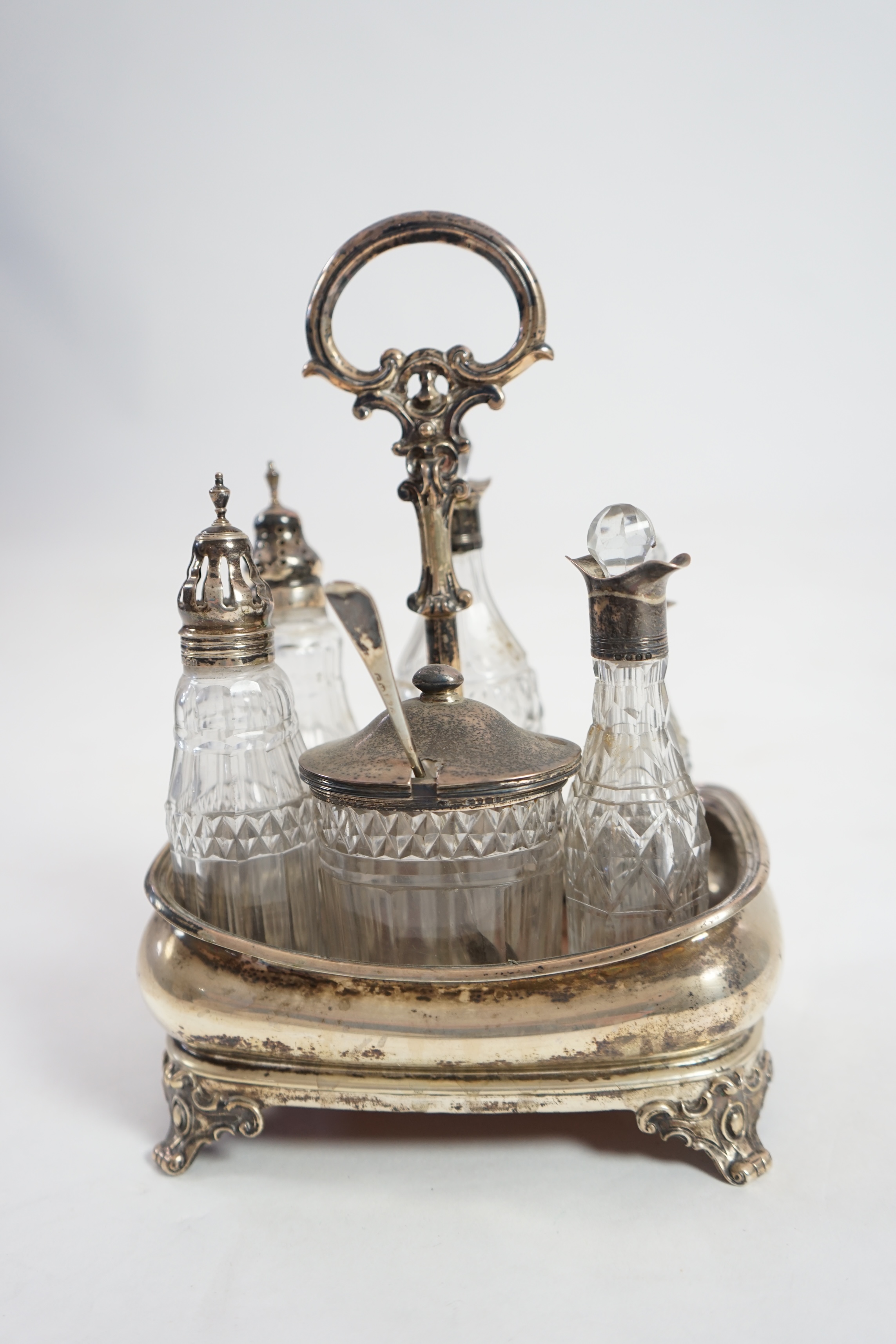 An early 19th century silver cruet stand